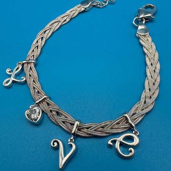LOVE charm bracelet with braided silver-tone chain. - Picture 1 of 8
